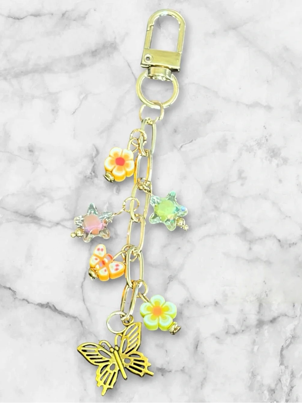 Gold Butterfly Charm Keychain with Pastel Flower & Star Charms